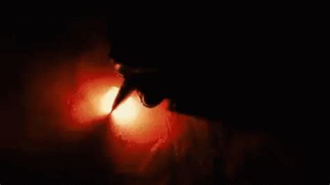 writing on fire gif|black guy writing on fire.